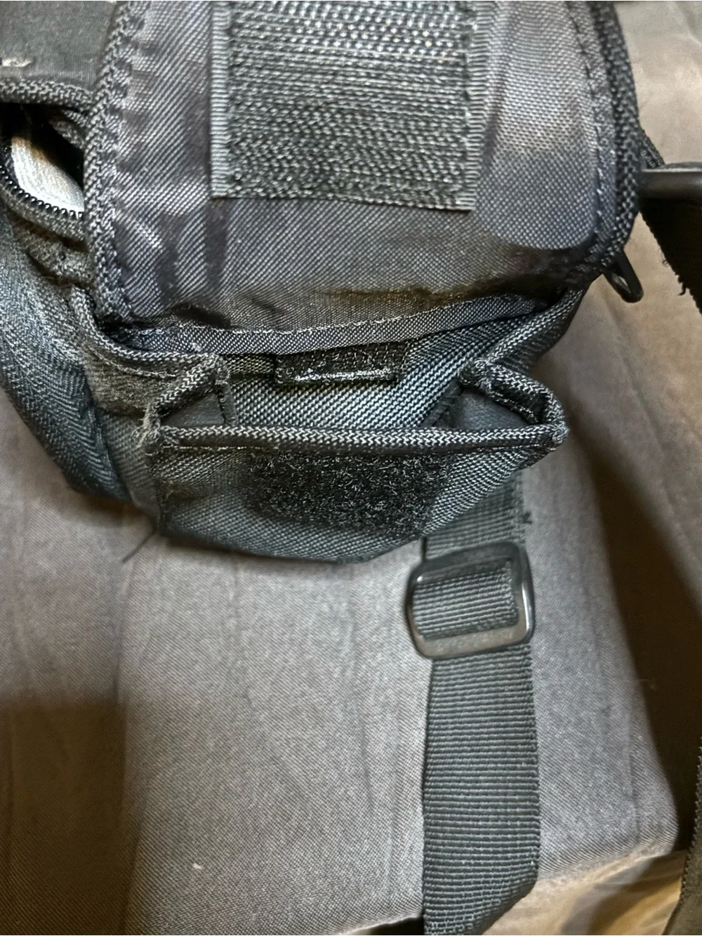 Lowepro Black Camera Shoulder Bag with Compact Holster and a free bag.